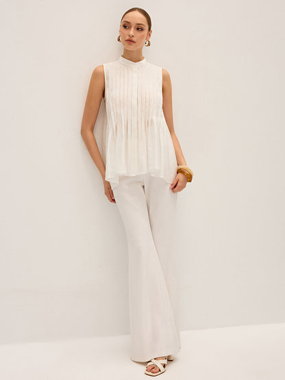 Semi-Sheer Pleated Mock Neck Blouse