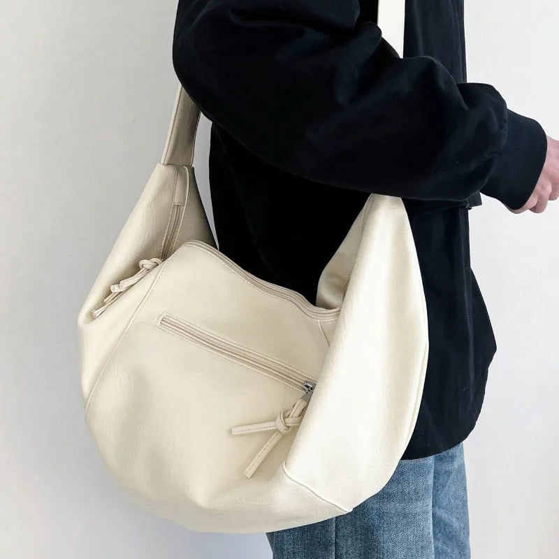 Stylish Dumpling Shaped PU Crossbody Bag for Men, Suitable for Casual Outings and Large Capacity Needs