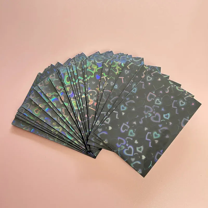 50pcs/lot 61*91mm Heart Love Laser Flashing Card Sleeves Protector For Photo Cards Holder Holographic Foil Protective Films