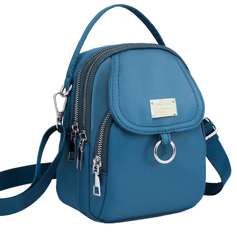 Neutral Style Shoulder Bag for Men and Women, Suitable for Travel and Photography It Is a Cross-Body Bag Made of Oxford Fabric.