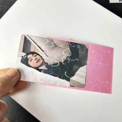 50pcs/lot 61*91mm Heart Love Laser Flashing Card Sleeves Protector For Photo Cards Holder Holographic Foil Protective Films