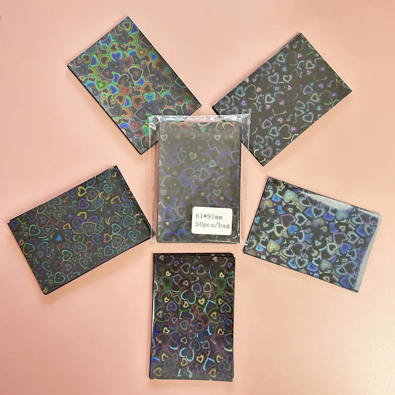 50pcs/lot 61*91mm Heart Love Laser Flashing Card Sleeves Protector For Photo Cards Holder Holographic Foil Protective Films