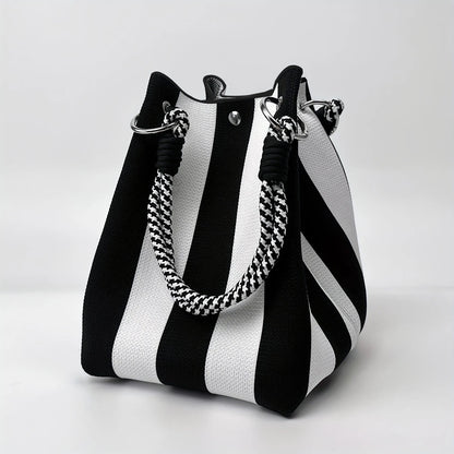 This multi-color knitted retro bucket handbag is simple and color-blocked, versatile and easy to carry with you