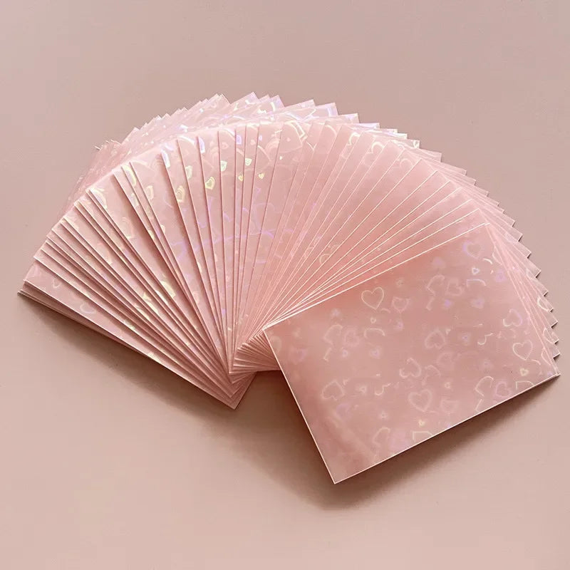 50pcs/lot 61*91mm Heart Love Laser Flashing Card Sleeves Protector For Photo Cards Holder Holographic Foil Protective Films