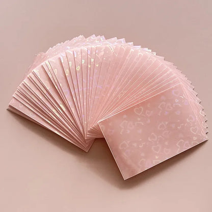 50pcs/lot 61*91mm Heart Love Laser Flashing Card Sleeves Protector For Photo Cards Holder Holographic Foil Protective Films