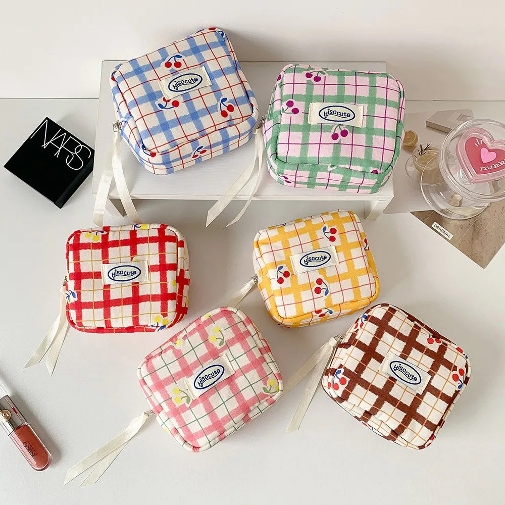 Korean version of large plaid cosmetic bag high value small cherry sanitary napkin portable mini storage bag bluetooth headset b