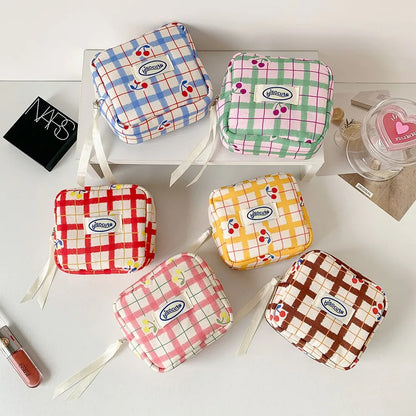 Korean version of large plaid cosmetic bag high value small cherry sanitary napkin portable mini storage bag bluetooth headset b