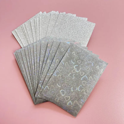 50pcs/lot 61*91mm Heart Love Laser Flashing Card Sleeves Protector For Photo Cards Holder Holographic Foil Protective Films