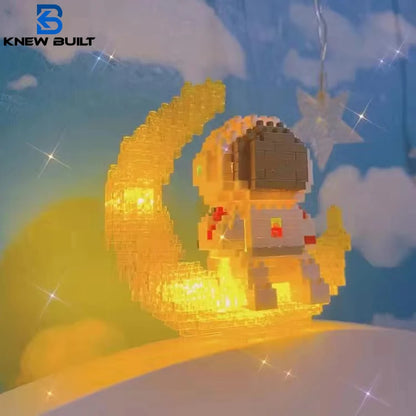 Knew built Luminous Astronaut Moon Micro brick Building Blocks Set Educational Toys LED Light Technology Bricks for Adults