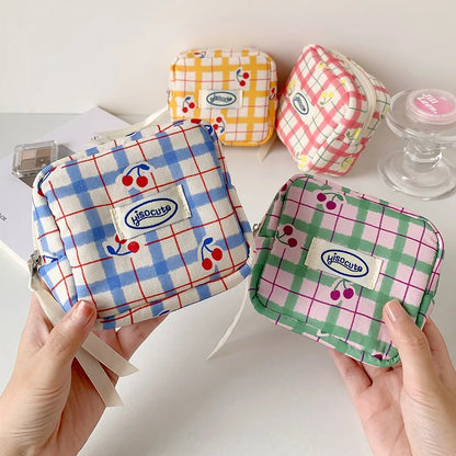 Korean version of large plaid cosmetic bag high value small cherry sanitary napkin portable mini storage bag bluetooth headset b