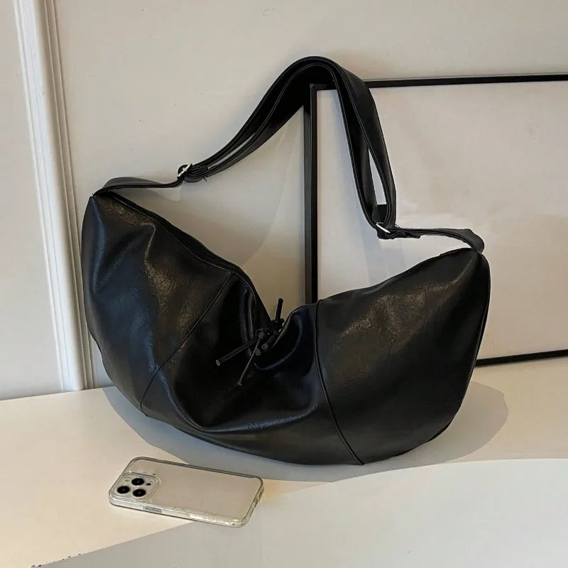 Stylish Dumpling Shaped PU Crossbody Bag for Men, Suitable for Casual Outings and Large Capacity Needs