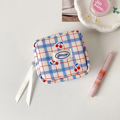 Korean version of large plaid cosmetic bag high value small cherry sanitary napkin portable mini storage bag bluetooth headset b