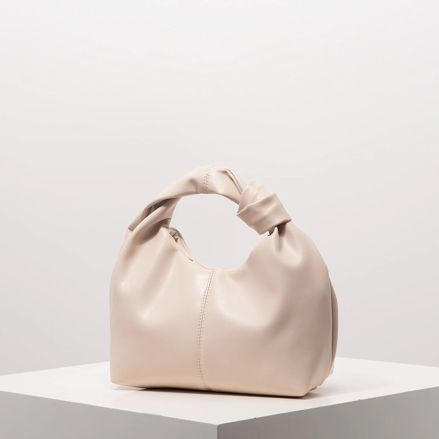 Stylish twist square bag, solid color top clutch bag, simple and versatile commut