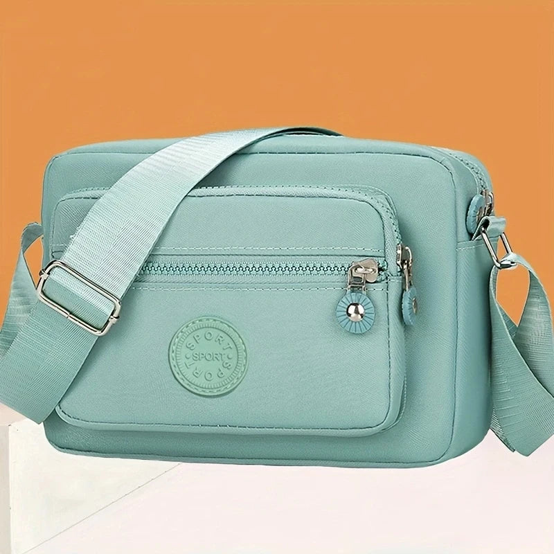 Women's solid color multi-pocket crossbody bag, multi-functional shoulder bag, trendy same-color business bag